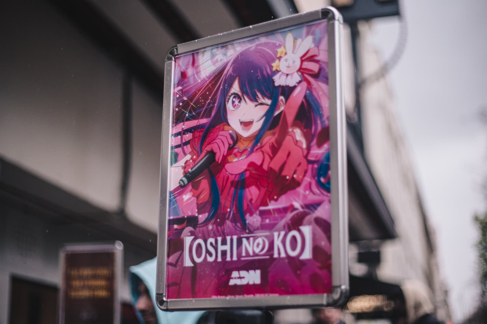 Oshi no Ko signage at the cinema entrance